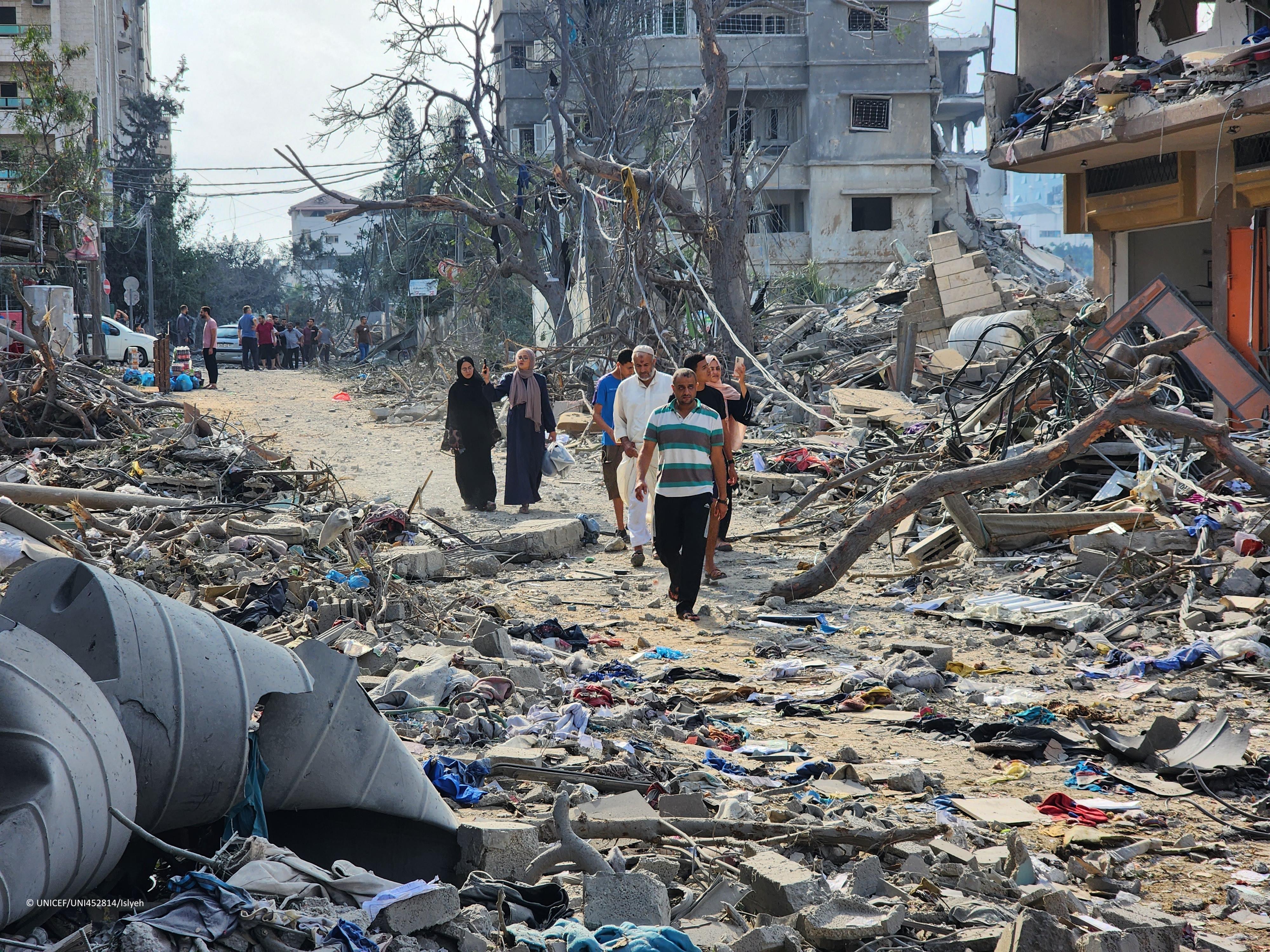 Photos show the rubble scattered throughout  Al-Rimal neighbourhood